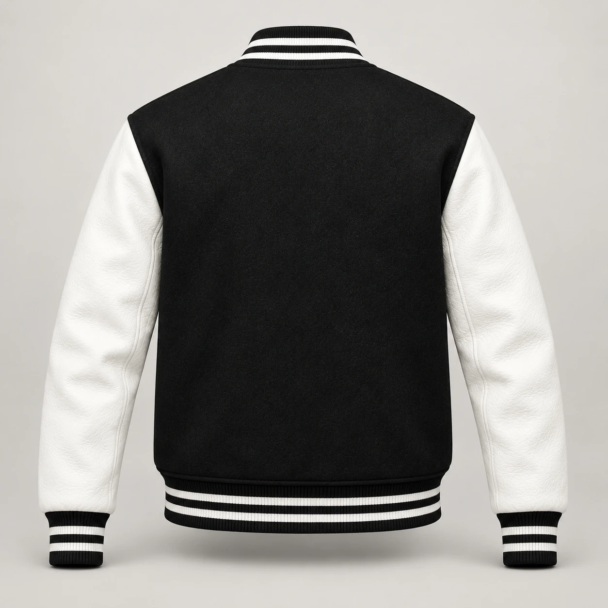 Back view of black wool and white leather varsity jacket