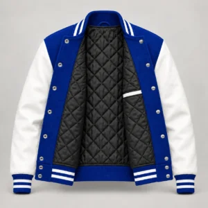 Royal blue wool and white leather varsity jacket, open view showing black quilted lining, one left interior pocket and steel snap backs